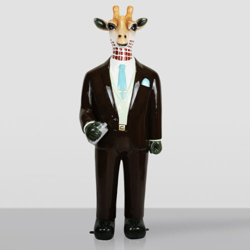 Glossy statue of a giraffe dressed in a dark brown suit with a light blue tie and pocket square, holding a silver flask, standing against a plain light gray background.