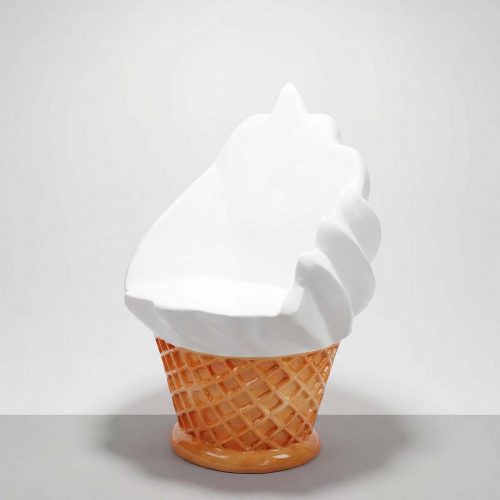 figure ice cream cone sculpture in fiberglass, white soft-serve swirl on tan waffle cone, playful advertising or mall decor