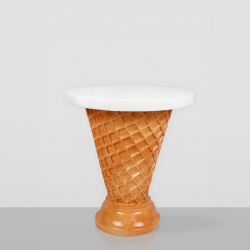 A small table with a white round tabletop and a base shaped like an inverted waffle cone with a glossy light brown finish, resembling an ice cream cone.