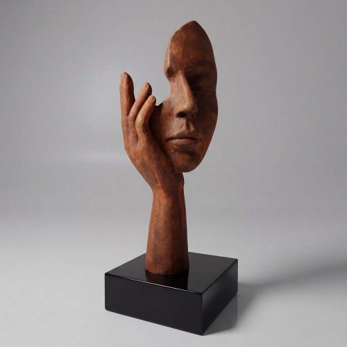 sculpture face and hand figure in rust-brown fiberglass with artistic fragmented style on black base for decor or display