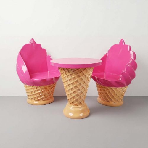 figure ice cream cone chairs and table in fiberglass with glossy pink scoop seats and waffle-cone bases for retail or event décor