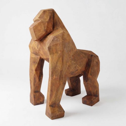 figure gorilla sculpture in faceted geometric style, brown fiberglass finish for decor or mall advertising