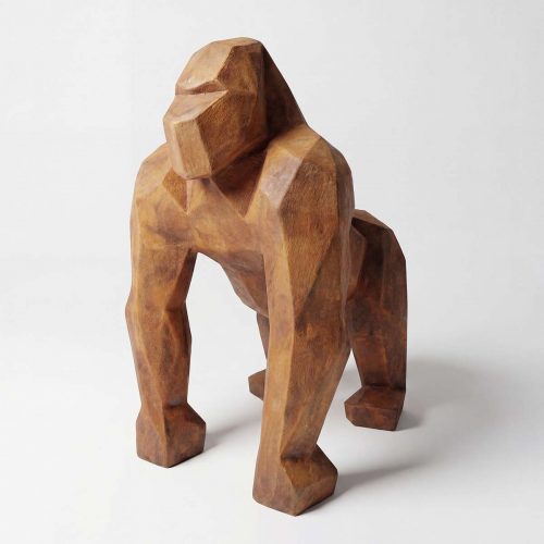 sculpture gorilla figure in brown laminate with geometric faceted style for interior decor or retail display