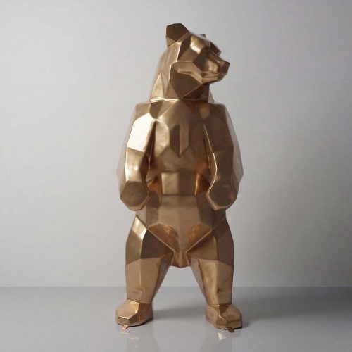 sculpture bear figure in glossy faceted gold finish, geometric modern style fiberglass or laminate for decoration or retail display
