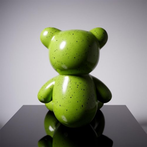 The small bear sitting with the logo