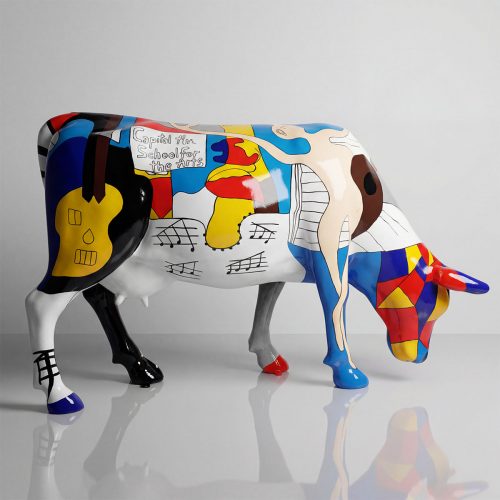 fiberglass sculpture cow painted in colorful pop-art style with musical motifs, geometric head, for advertising or mall decor