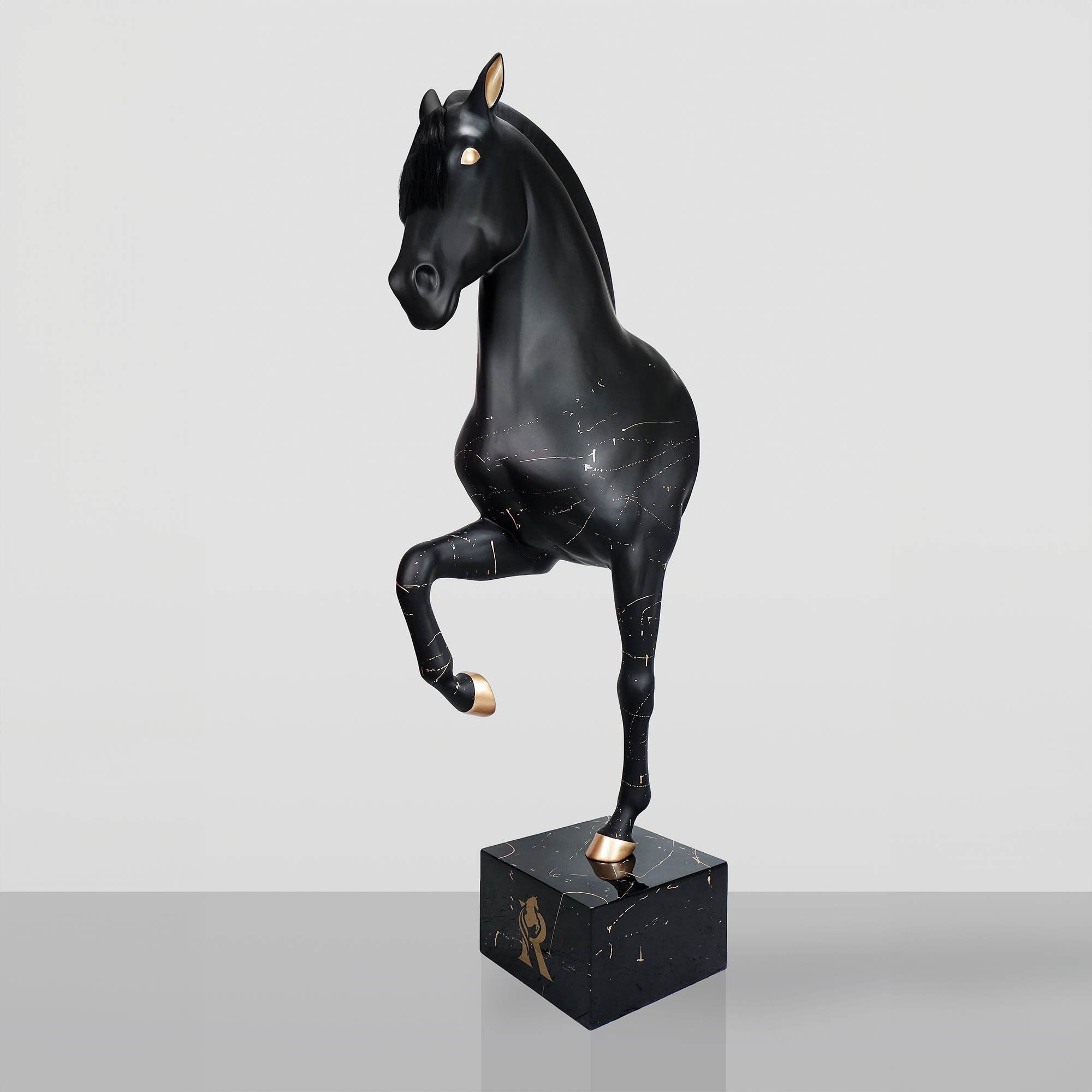 Life-size bust of a black horse on a pedestal
