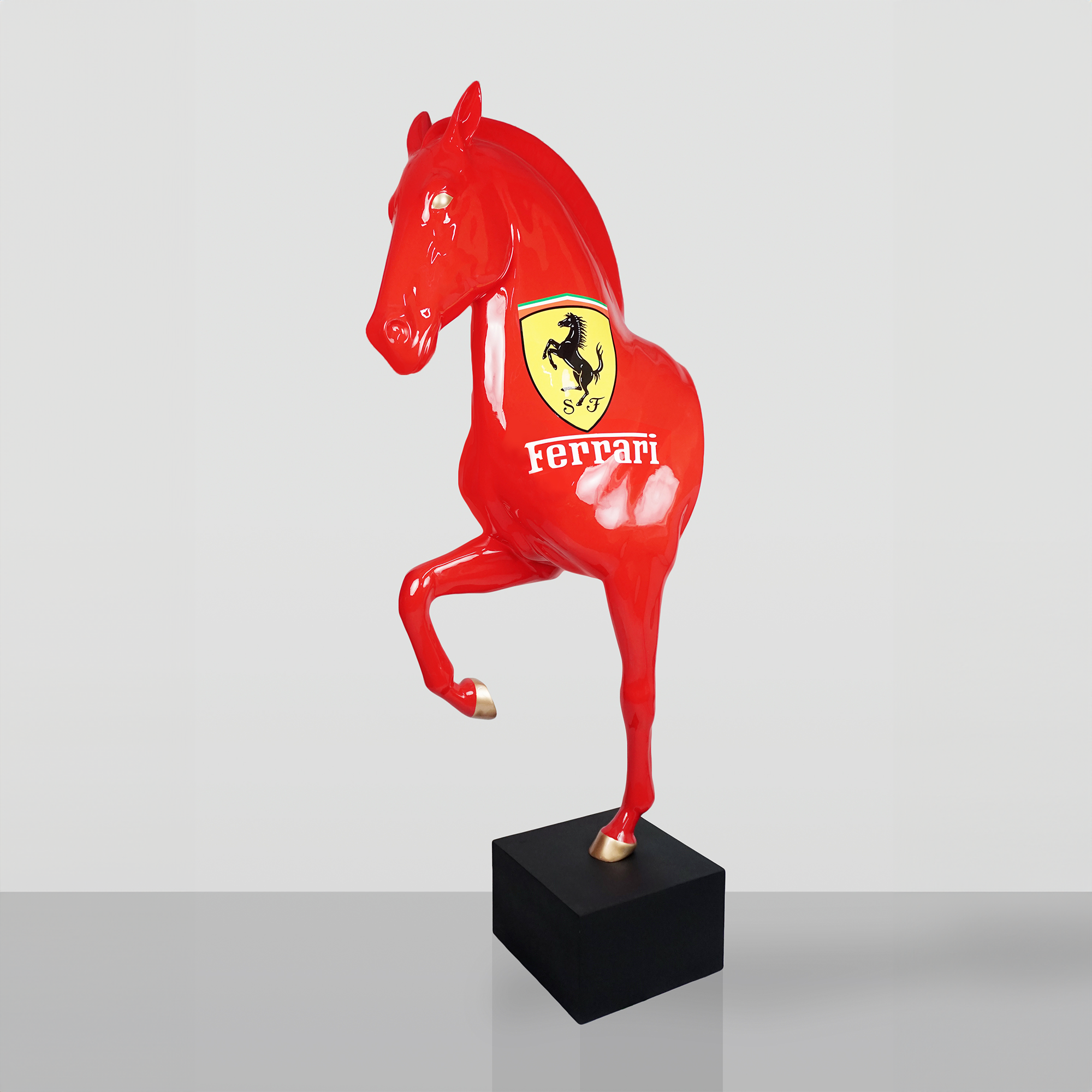 Life-size bust of a red Ferrari horse on a pedestal