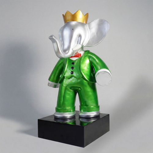 figure elephant sculpture in glossy green fiberglass suit with silver head and gold crown, whimsical advertising or decor use