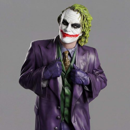 figure Joker-style clown sculpture in fiberglass with purple suit, green vest and smeared white face paint for advertising or decor