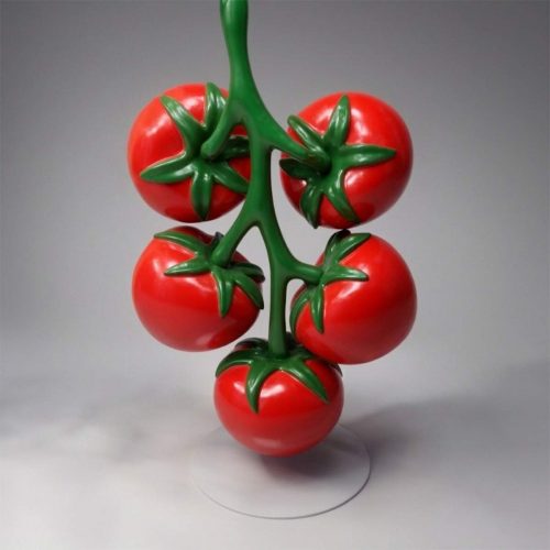 Advertising fiberglass tomato figure with a branch